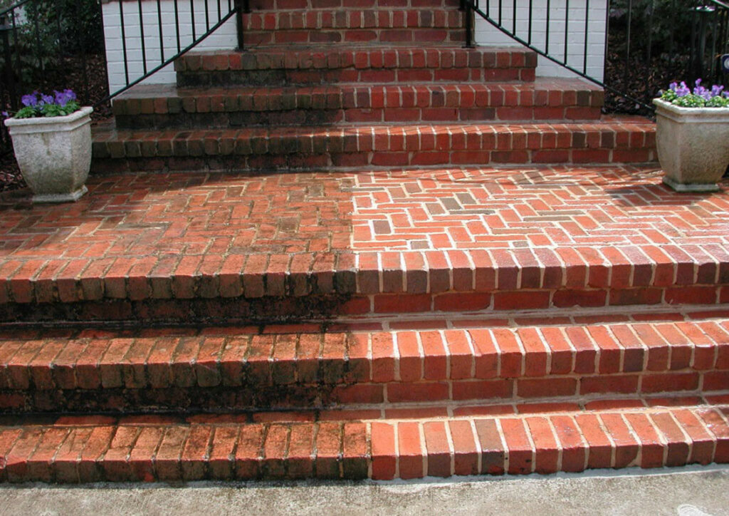 Paver stairs divided down the middle between old and new.